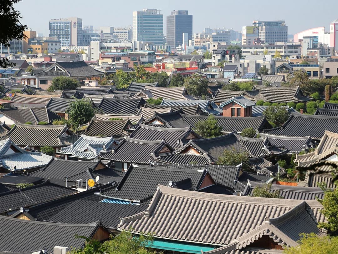 Rows of tiled hanok roofs seen from above in Jeonju Hanok Village